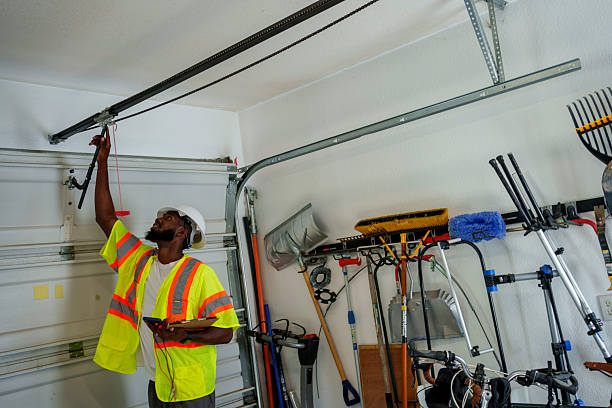 Professional Garage Door technician working in Woodville, FL
